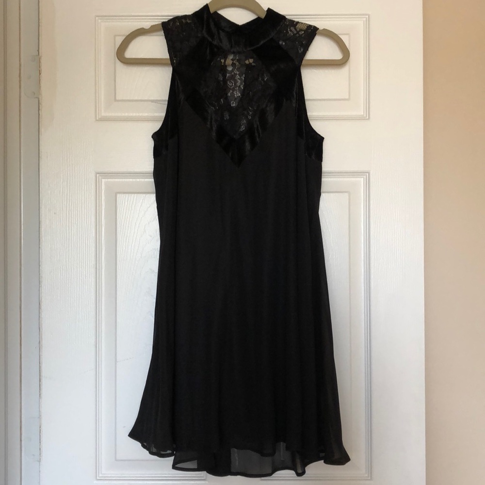 Black sleeveless chiffon dress
